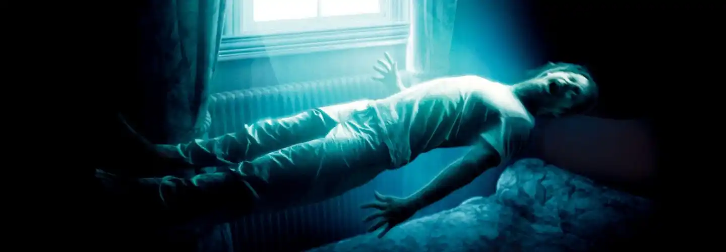 Milla Jovovich gets abducted from her bed in the poster for The Fourth Kind (2009).