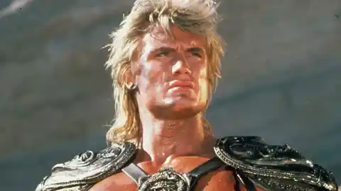 Dolph Lundgren (with muscles) as He-Man in the Masters of the Universe game.