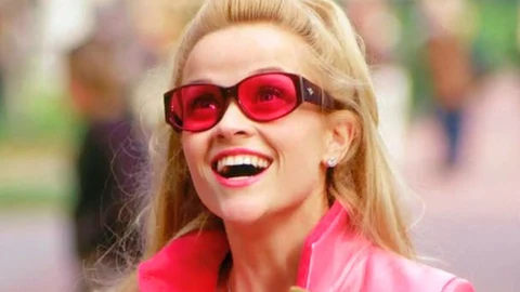 Reese Witherspoon as Elle Woods, first arriving at Harvard Law School in Legally Blonde (2001).